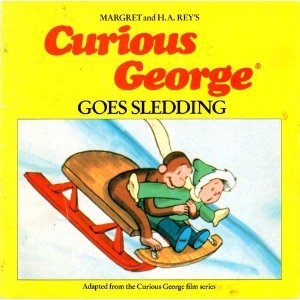 Curious George goes sledding